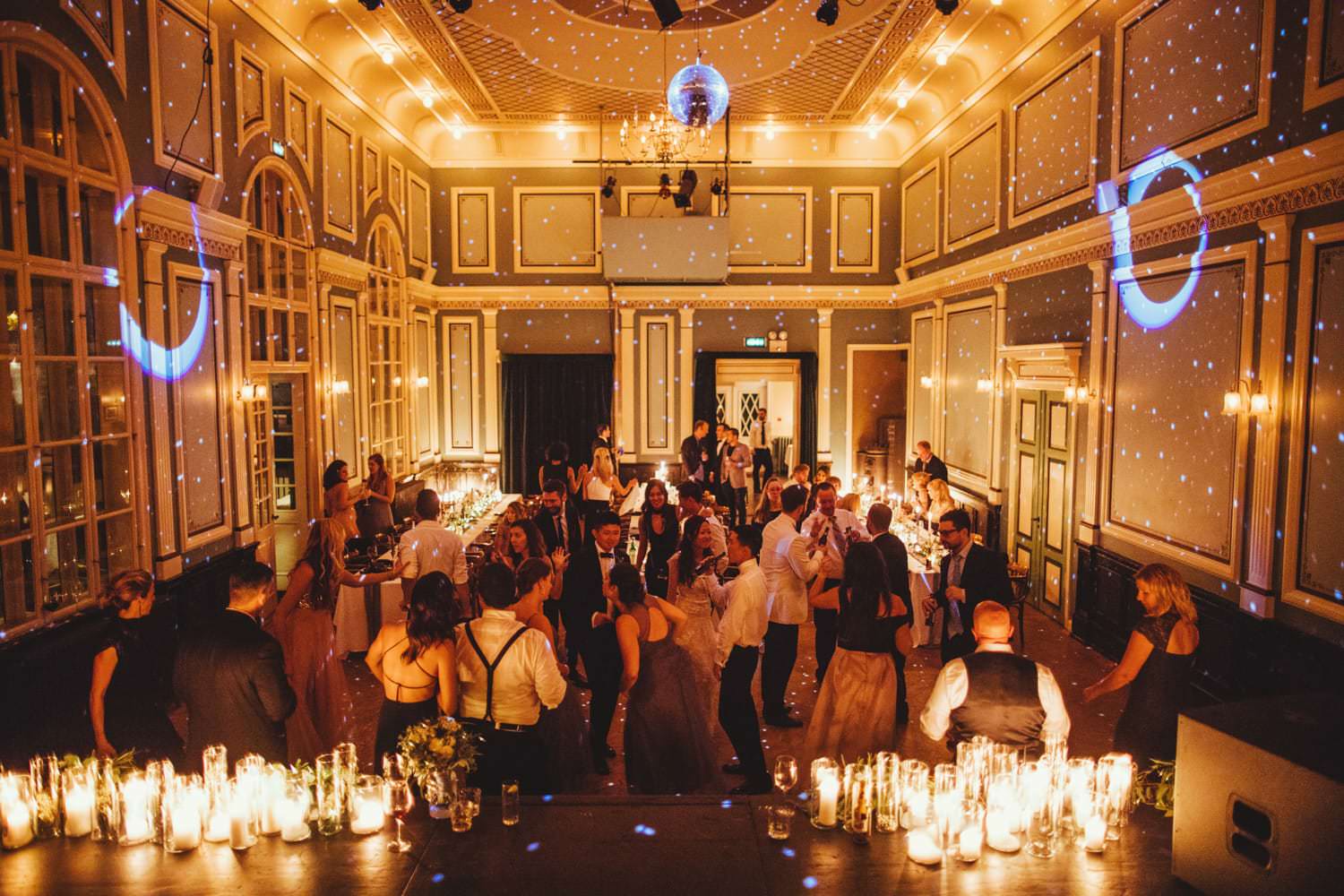 Wedding guests celebrate at a wedding reception in Idno Theatre, one of the most popular wedding venues in Iceland.