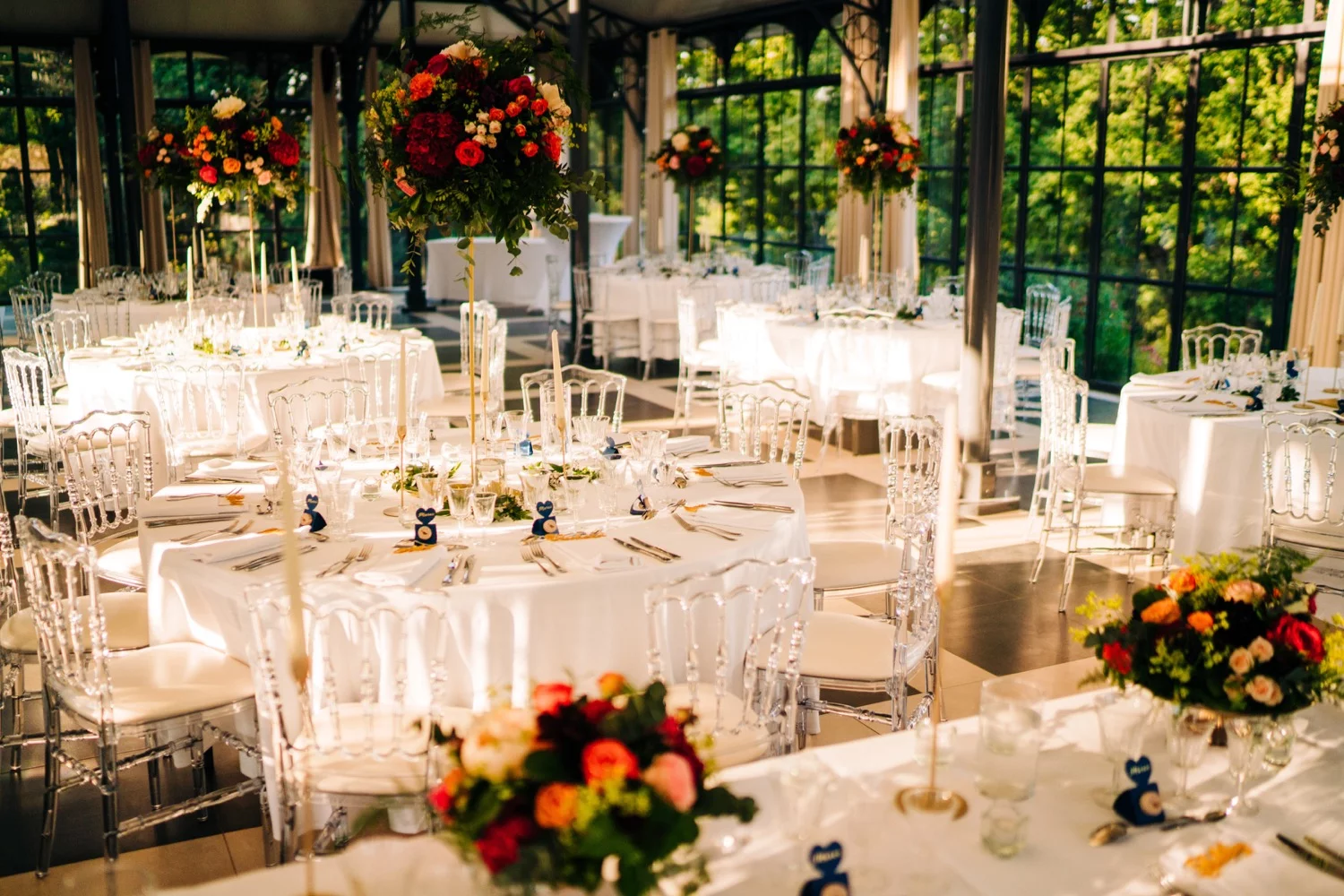 A gorgeous wedding reception set up in the Orangerie at Domaine La Fauconnie in France, one of the most beautiful wedding venues in Europe.